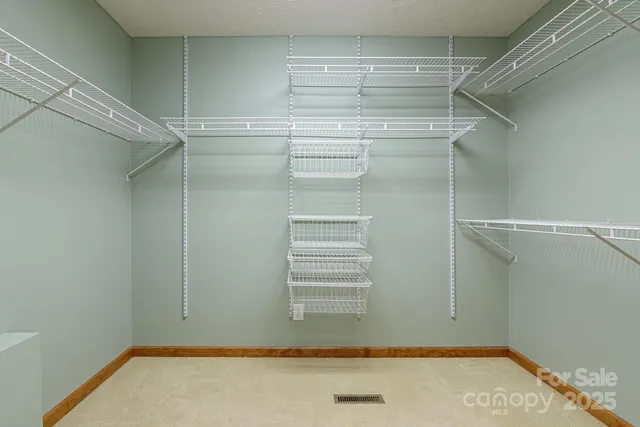 a view of a room with racks on the wall