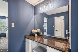 44 Goodwin Parkway Sewell, NJ 08080 - Photo 42 of 57 a bathroom with a granite countertop sink and a mirror