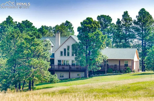 a view of a house with a swimming pool