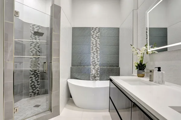 a bathroom with a bathtub and a sink