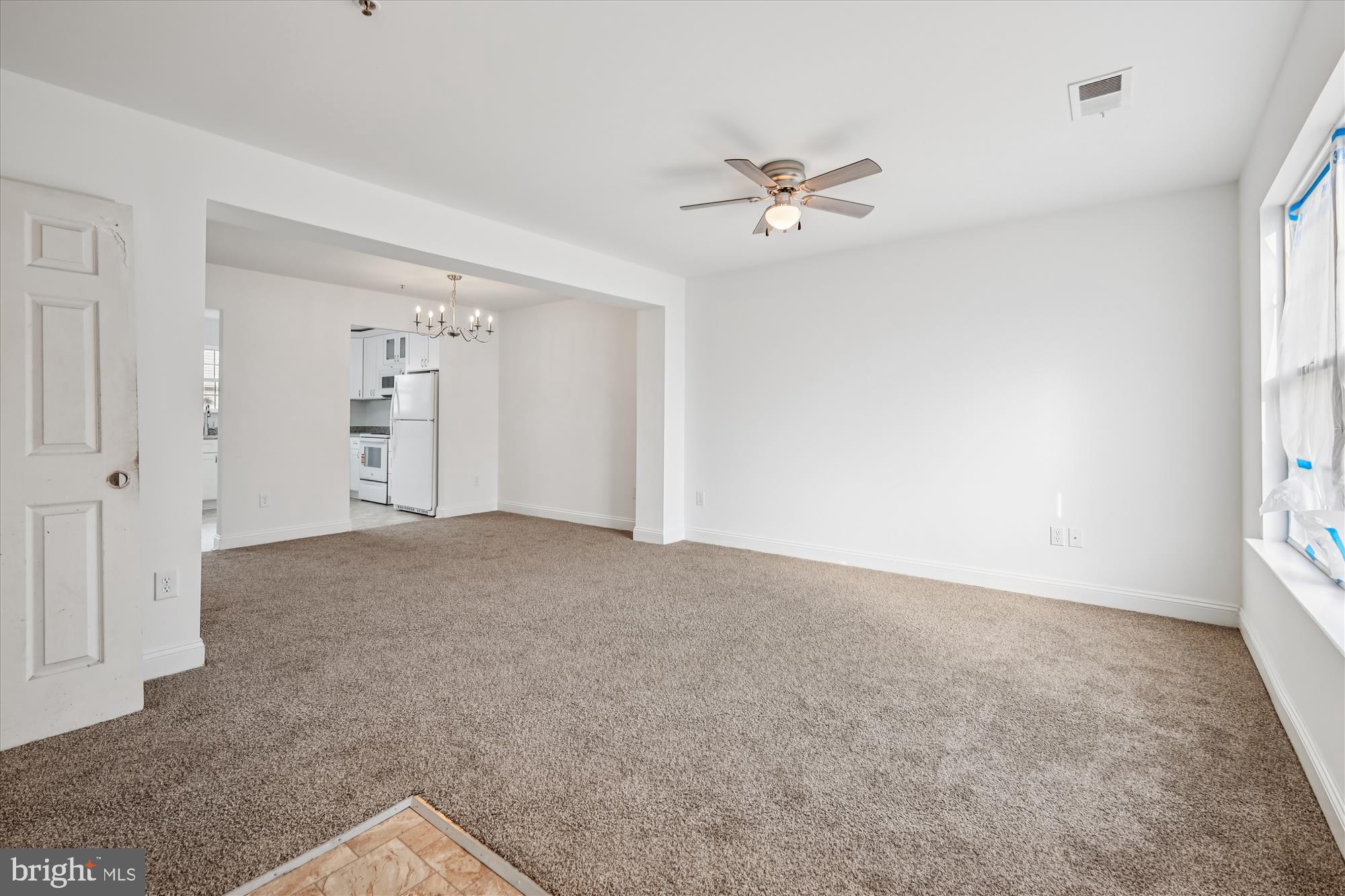 402 Ruddy Duck Court Cambridge, MD 21613 - Photo 16 of 47 Living Area looking into Dining Area