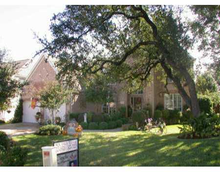 5230 Austral Loop Austin, TX 78739 - Photo 1 of 1 a view of a park with large trees