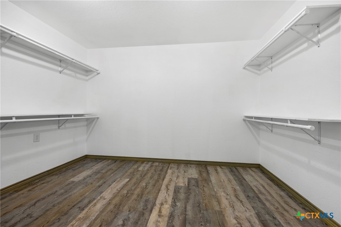 5107 Denmans Loop Belton, TX 76513 - Photo 14 of 48 a view of a room with wooden floor