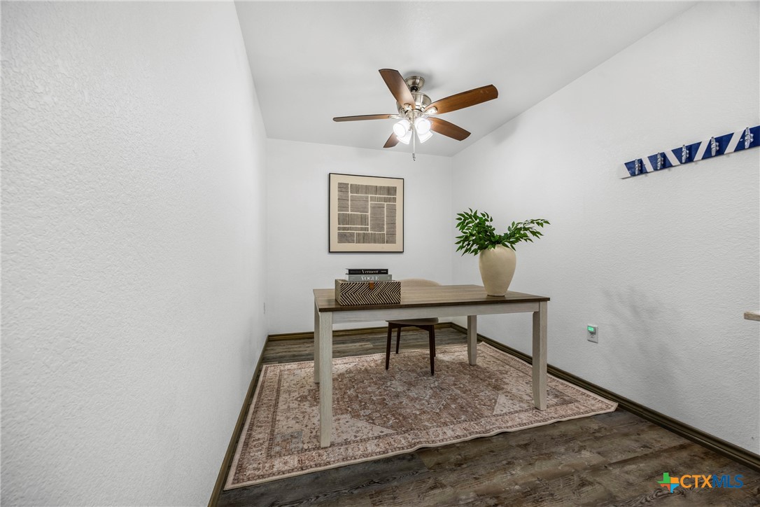 5107 Denmans Loop Belton, TX 76513 - Photo 19 of 48 a view of a workspace room with wooden floor