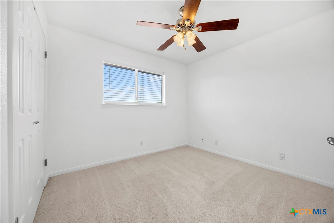 5107 Denmans Loop Belton, TX 76513 - Photo 26 of 48 an empty room with a fan & a window