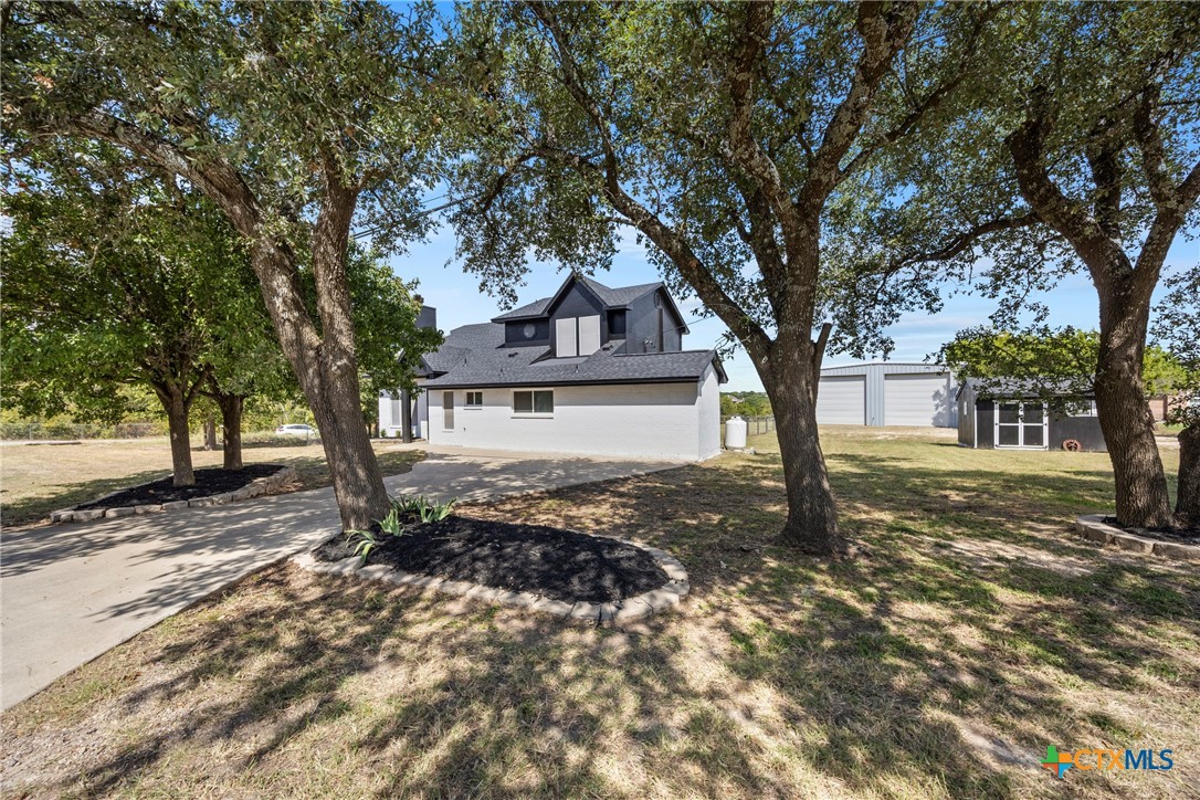 5107 Denmans Loop Belton, TX 76513 - Photo 43 of 48 a front view of a house with a yard