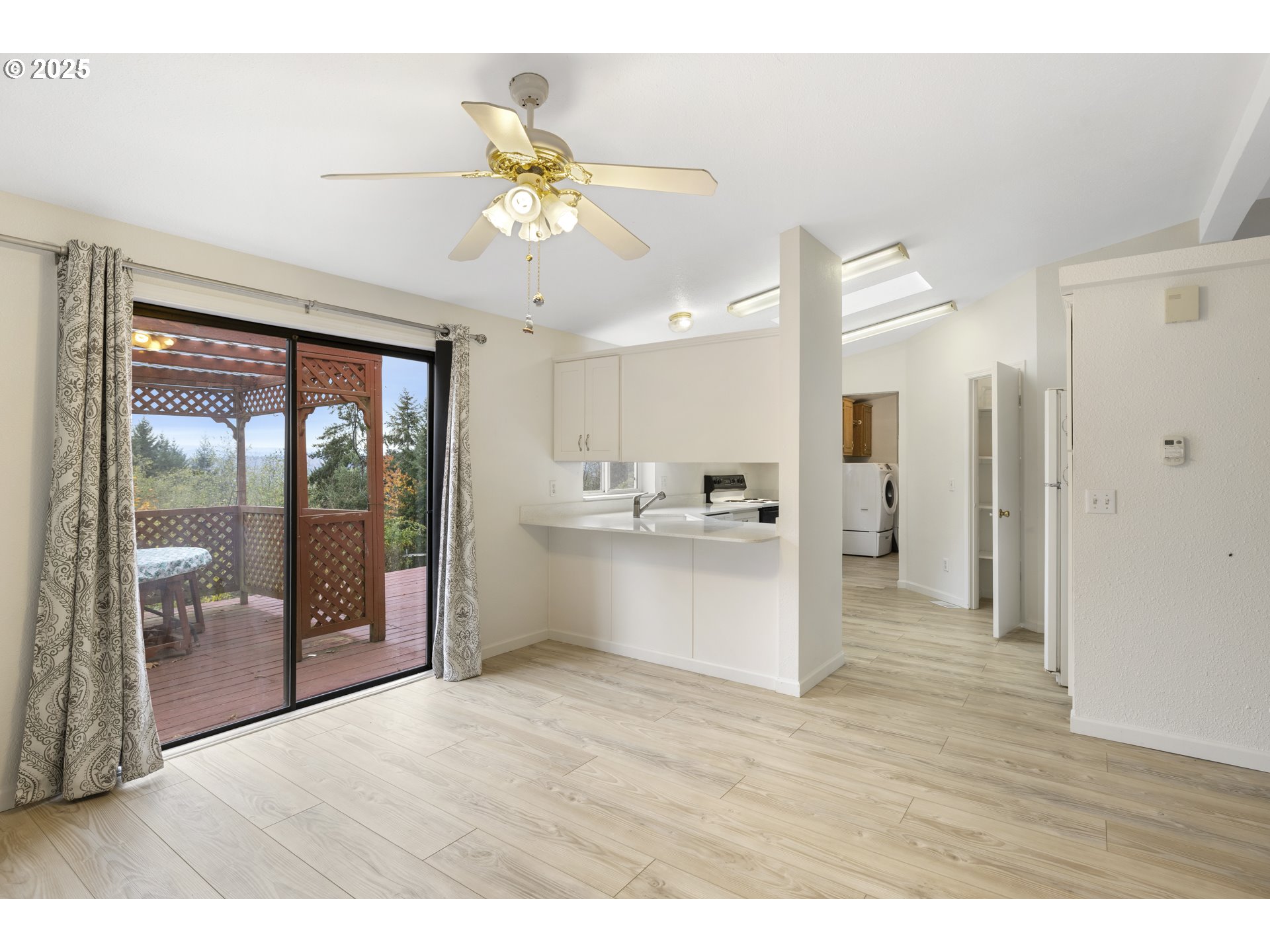 1115 China Garden Road Kalama, WA 98625 - Photo 17 of 40 a view interior of kitchen and hall with wooden floor