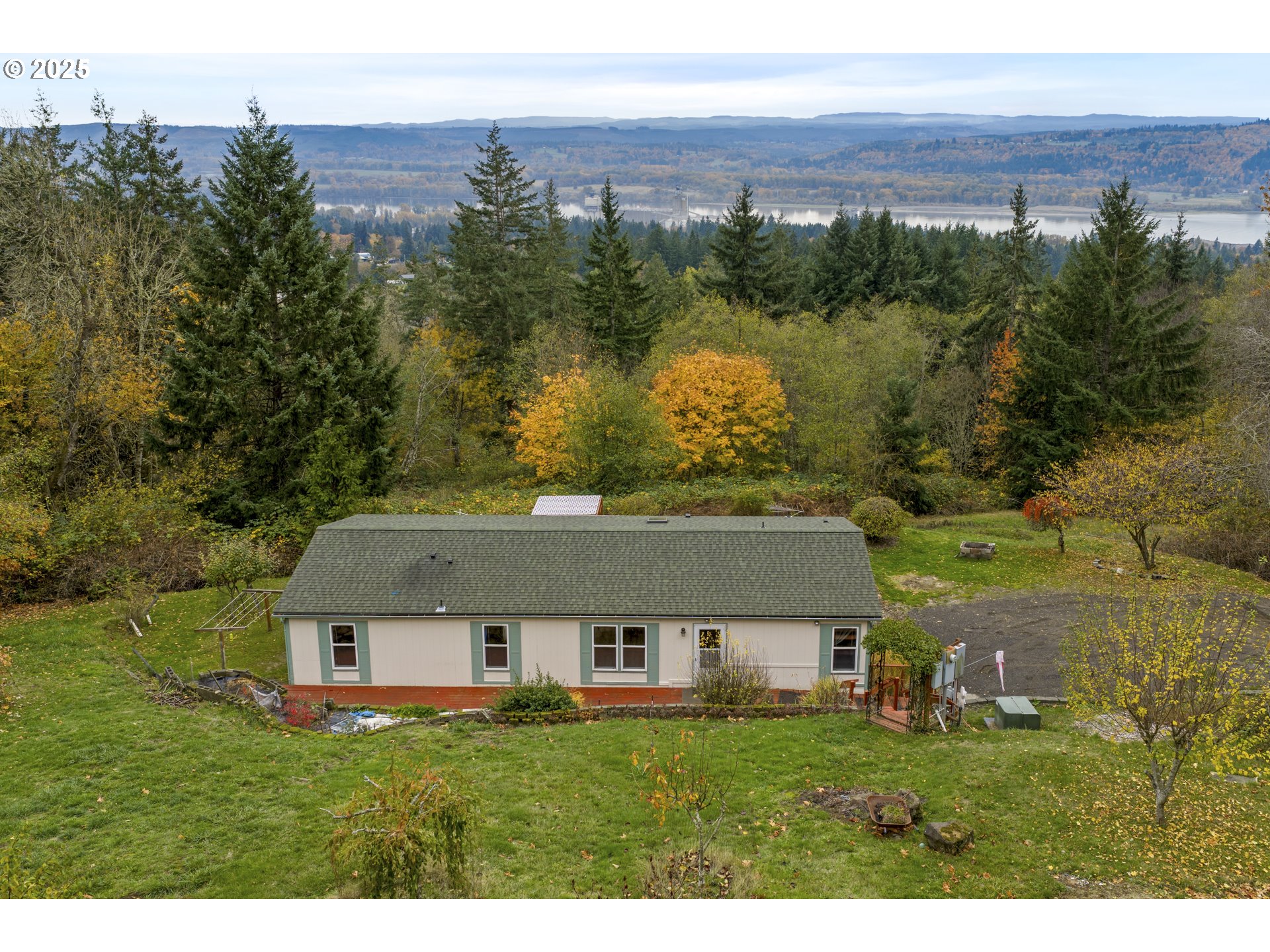 1115 China Garden Road Kalama, WA 98625 - Photo 2 of 40 an aerial view of house with yard and mountain view