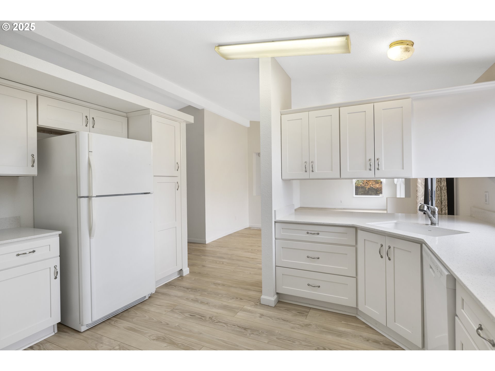 1115 China Garden Road Kalama, WA 98625 - Photo 22 of 40 a kitchen with a refrigerator and a sink