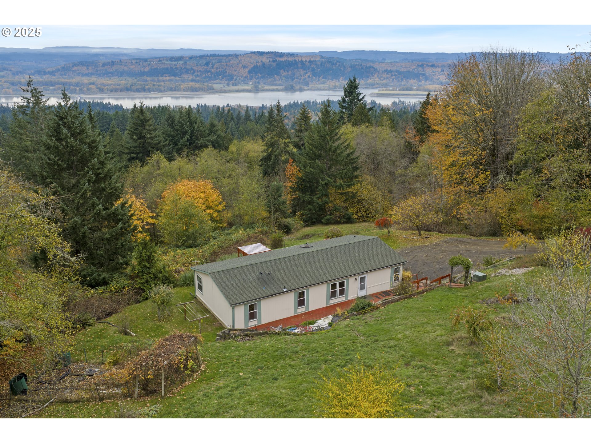 1115 China Garden Road Kalama, WA 98625 - Photo 33 of 40 a view of a lake with a yard