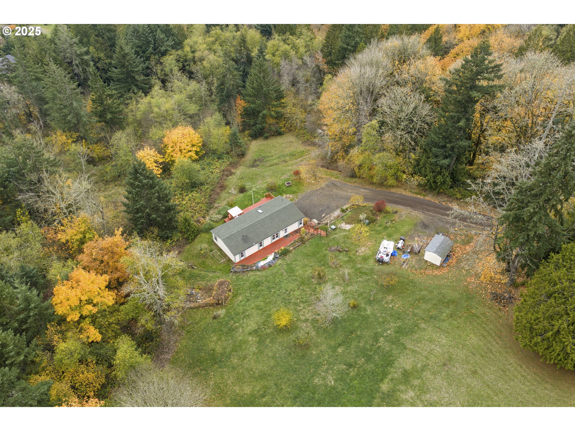 1115 China Garden Road Kalama, WA 98625 - Photo 39 of 40 a aerial view of a house with yard