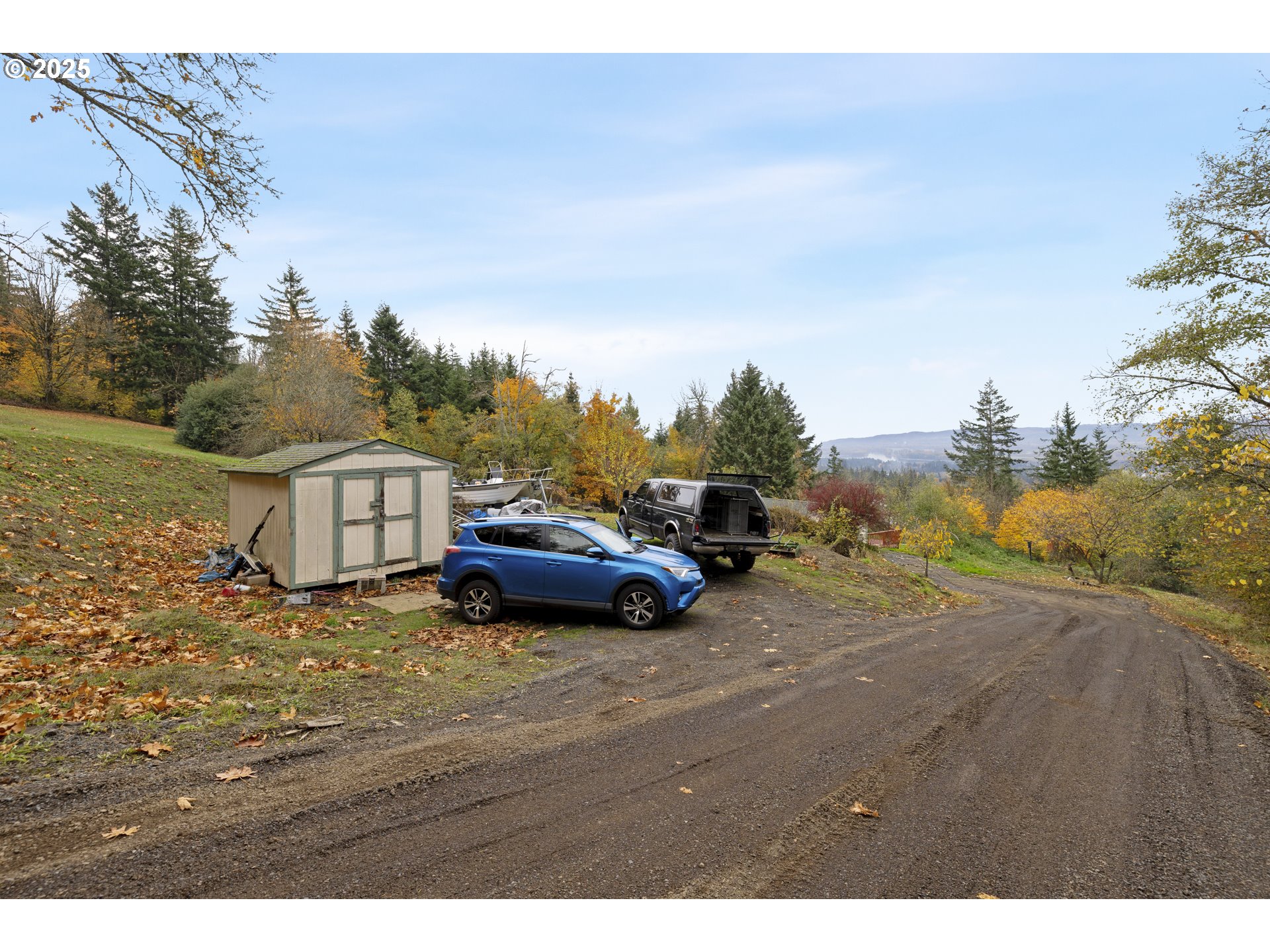 1115 China Garden Road Kalama, WA 98625 - Photo 40 of 40 a view of yard with house and car parked in the background