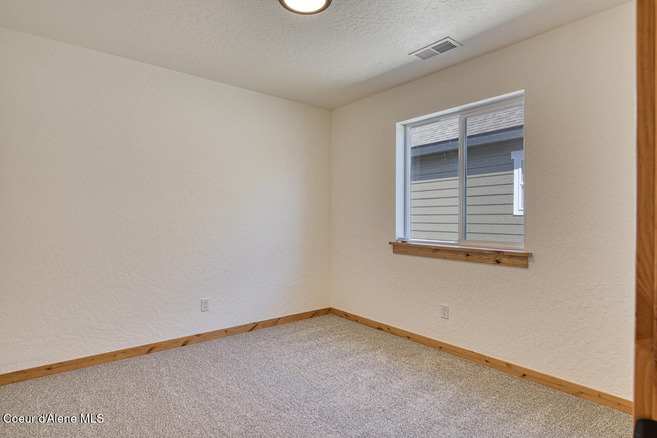 3606 Blaze Loop Post Falls, ID 83854 - Photo 29 of 38 Bedroom 3