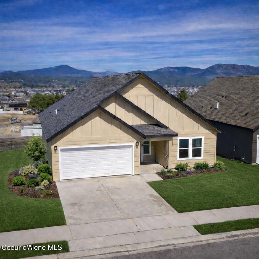 3606 Blaze Loop Post Falls, ID 83854 - Photo 37 of 38 Suburban house with landscaped yard