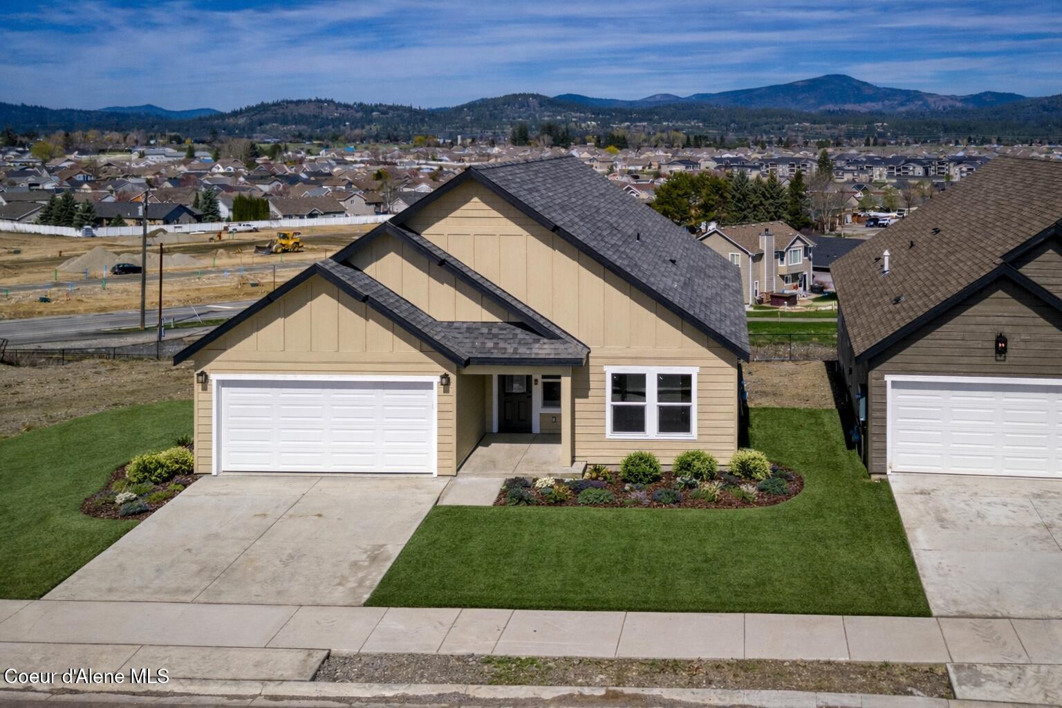 3606 Blaze Loop Post Falls, ID 83854 - Photo 38 of 38 New suburban home with landscaped yard