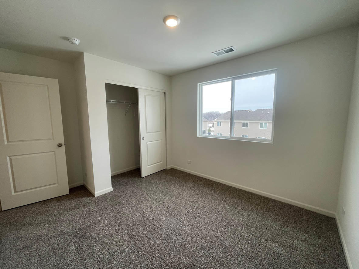 762 Westbury Drive Cary, IL 60013 - Photo 19 of 21 an empty room with a window