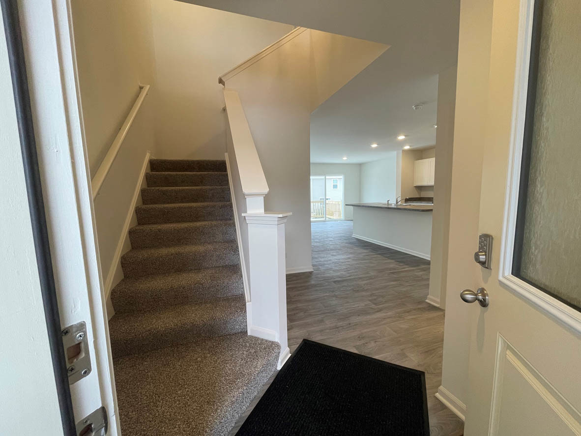 762 Westbury Drive Cary, IL 60013 - Photo 2 of 21 a view of entryway and hall with wooden floor