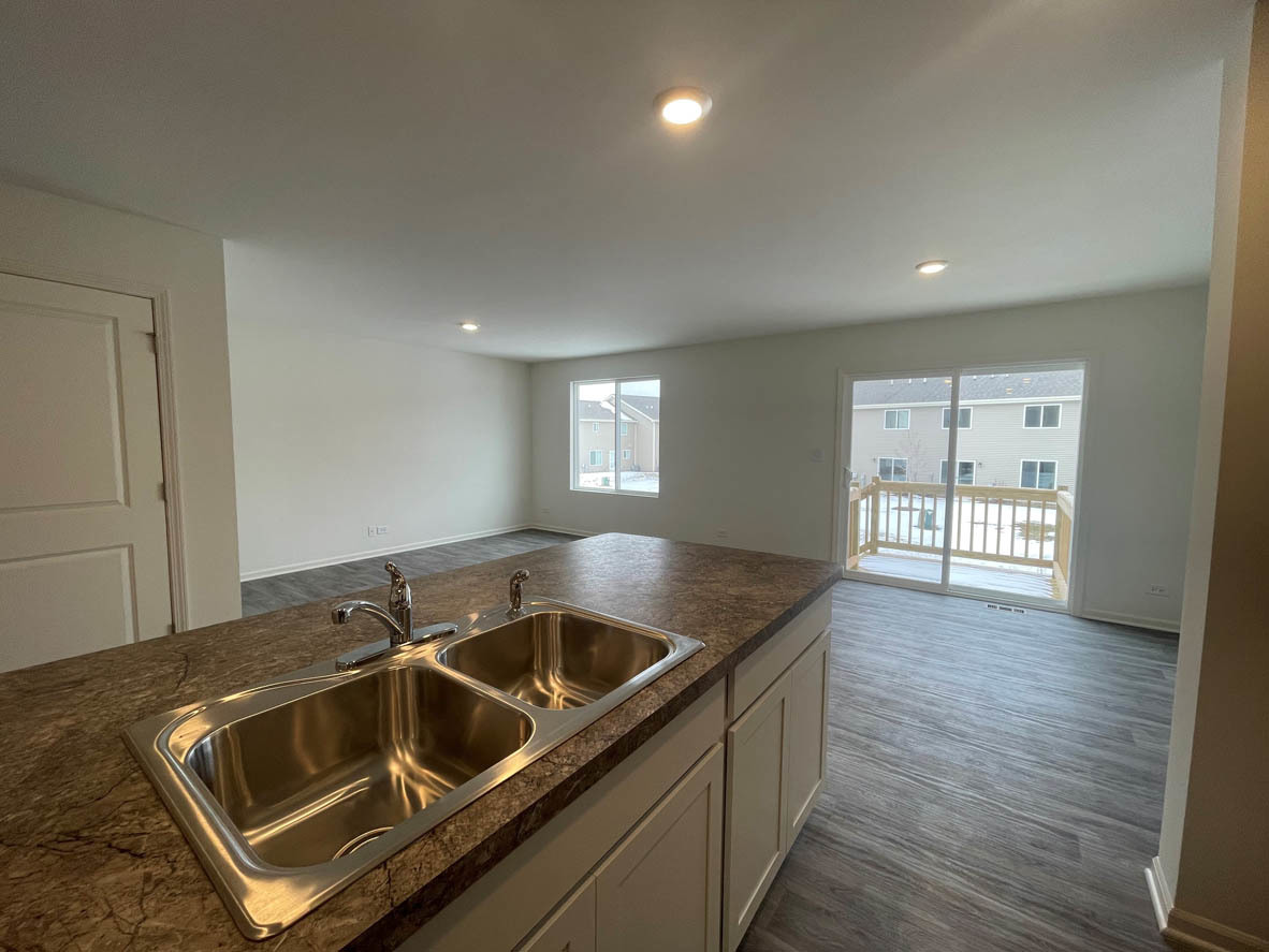 762 Westbury Drive Cary, IL 60013 - Photo 5 of 21 a kitchen that has a sink