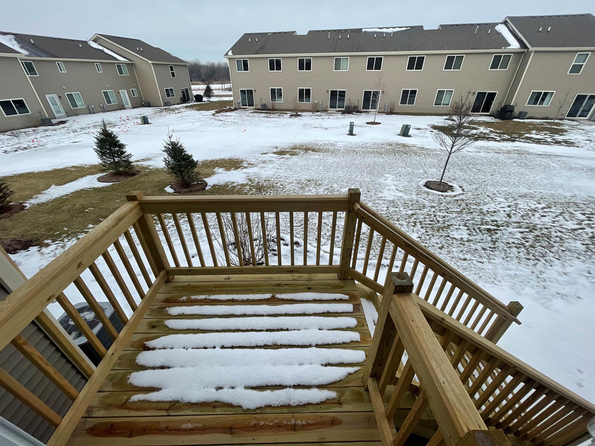 762 Westbury Drive Cary, IL 60013 - Photo 7 of 21 a view of a balcony with two chairs