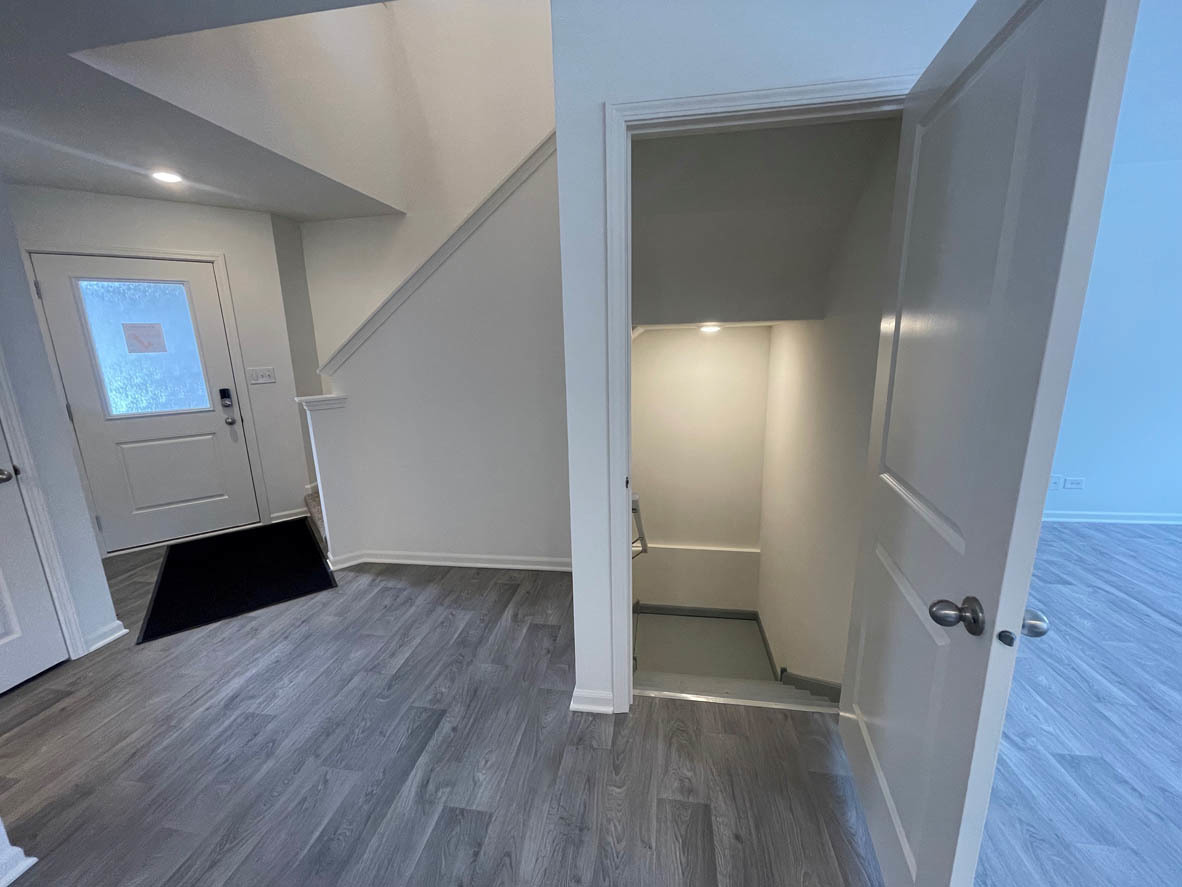 762 Westbury Drive Cary, IL 60013 - Photo 8 of 21 a view of empty room with wooden floor