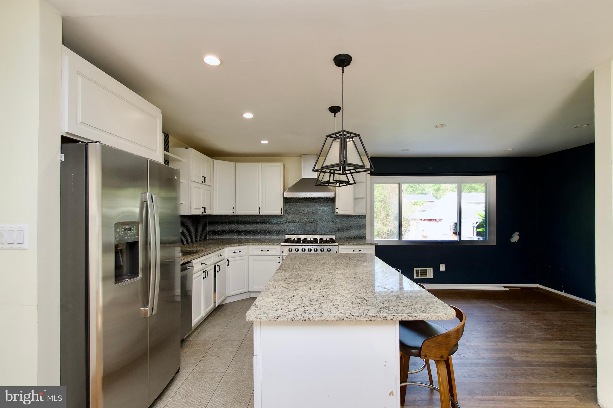 7538 Axton Street Springfield, VA 22151 - Photo 8 of 38 Updated open kitchen w granite & stainless steel