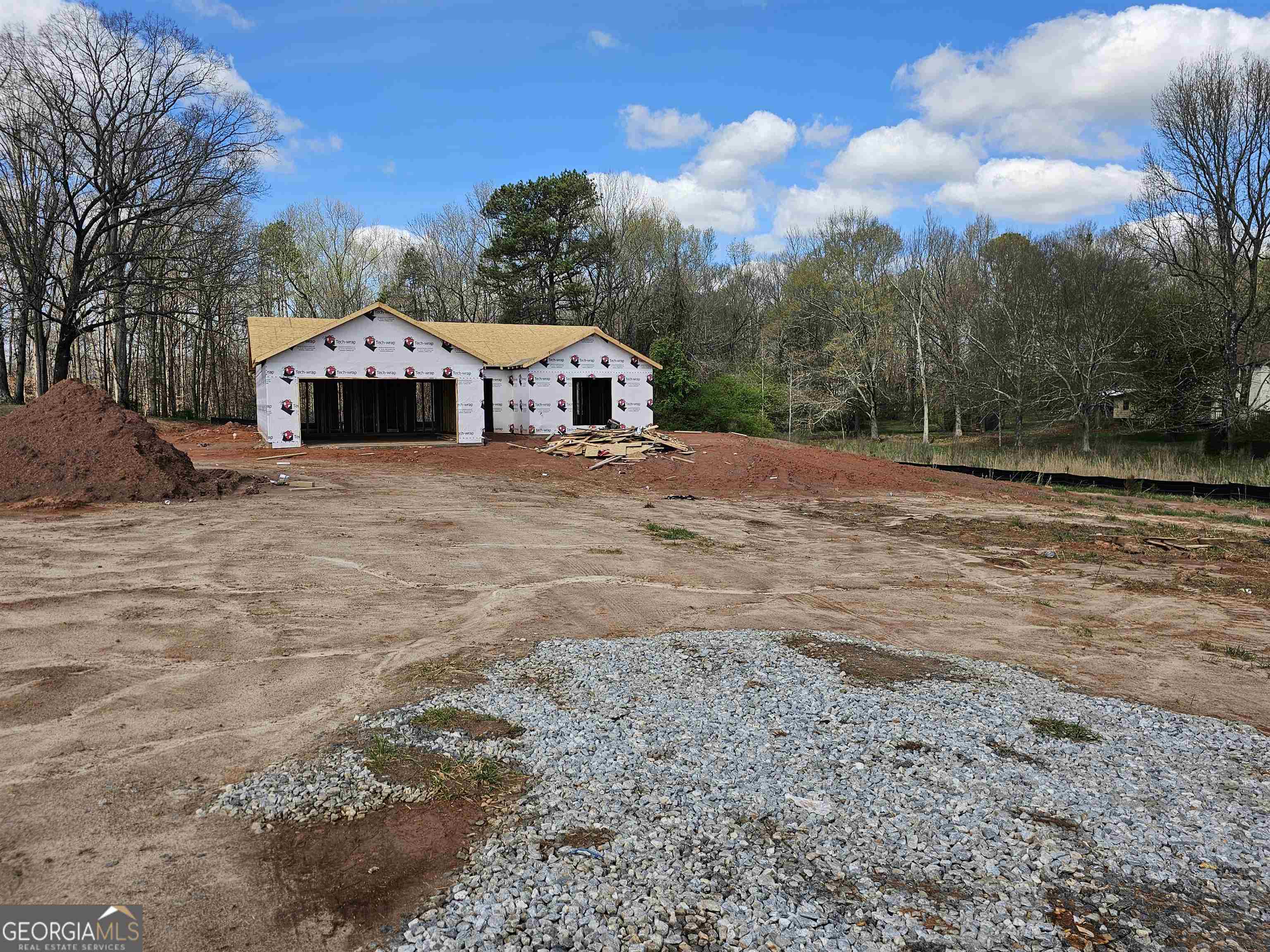 196 Seagraves Road, Unit 1 Hull, GA 30646 - Photo 1 of 1 a view of a house with a yard
