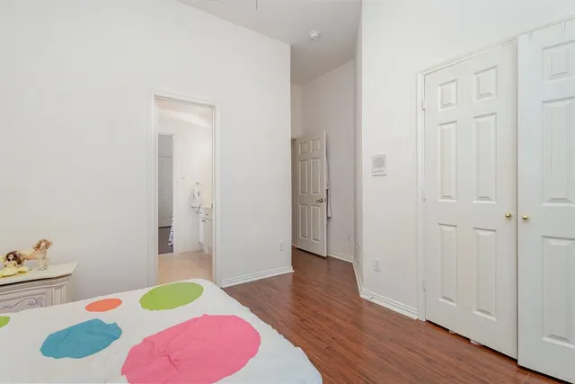 a view of room with workspace and windows