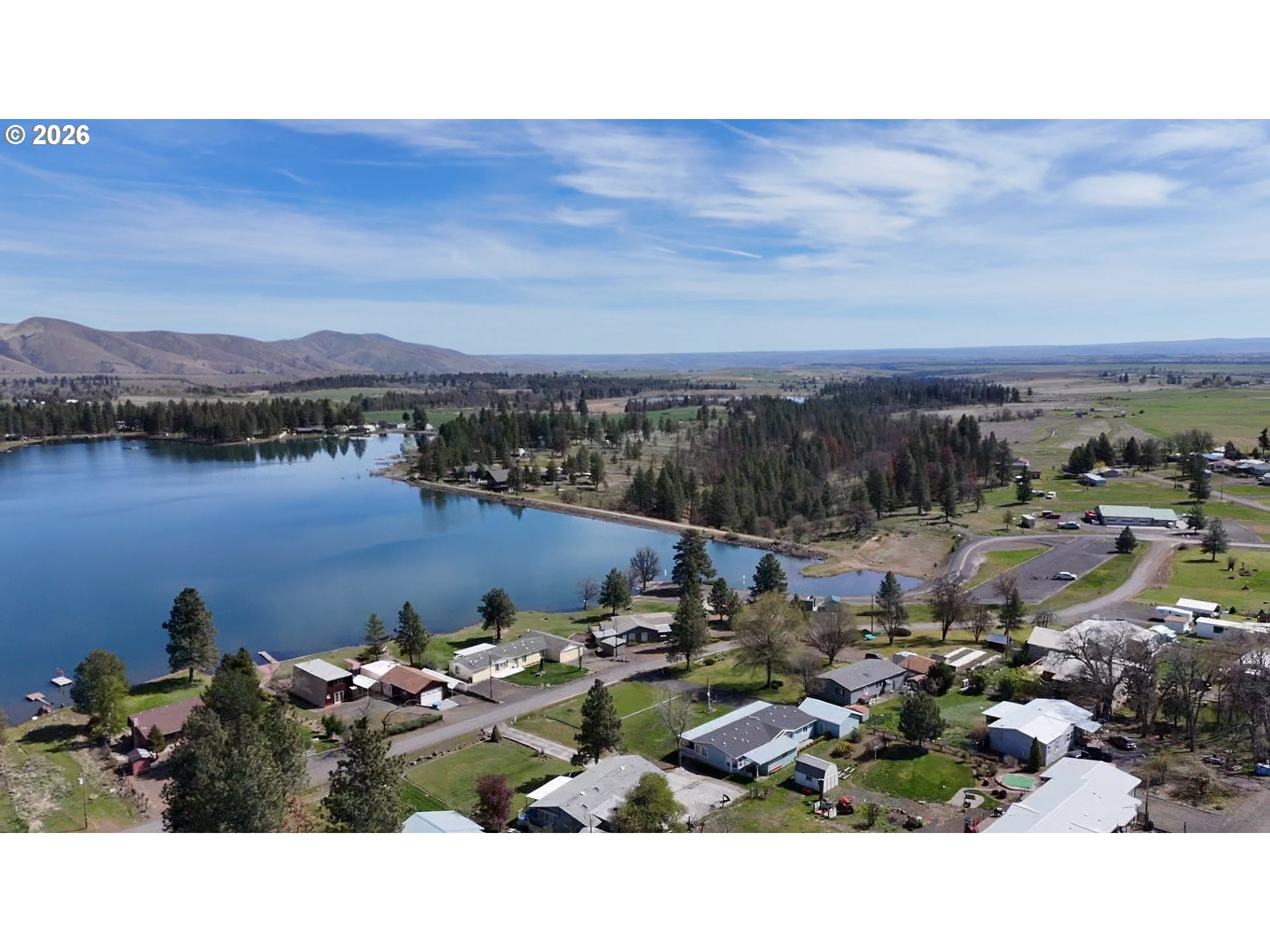 110 South Mike Road Tygh Valley, OR 97063 - Photo 23 of 42 a view of a lake with houses