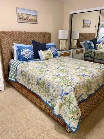 a bathroom with a sink a toilet and shower curtain