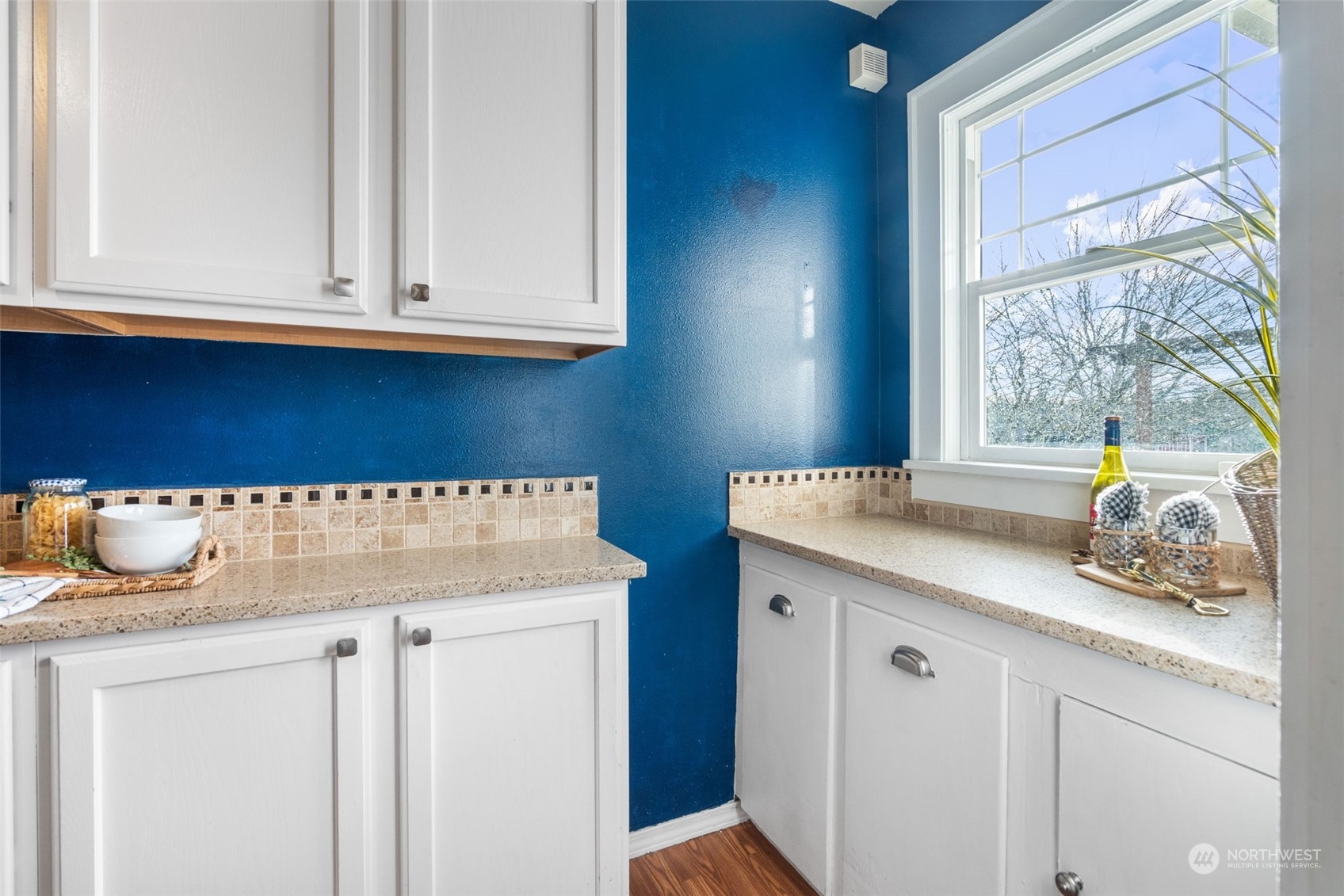 2628 Old Highway 99 North Road Burlington, WA 98233 - Photo 11 of 40 a kitchen with white cabinets and sink
