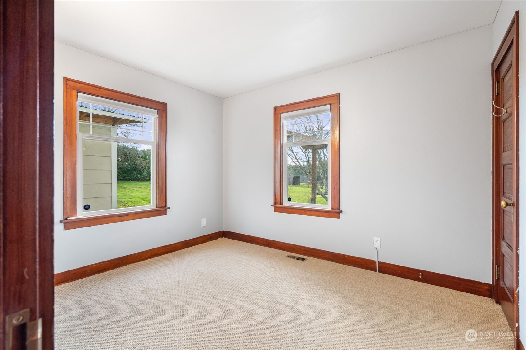 2628 Old Highway 99 North Road Burlington, WA 98233 - Photo 16 of 40 an empty room with windows