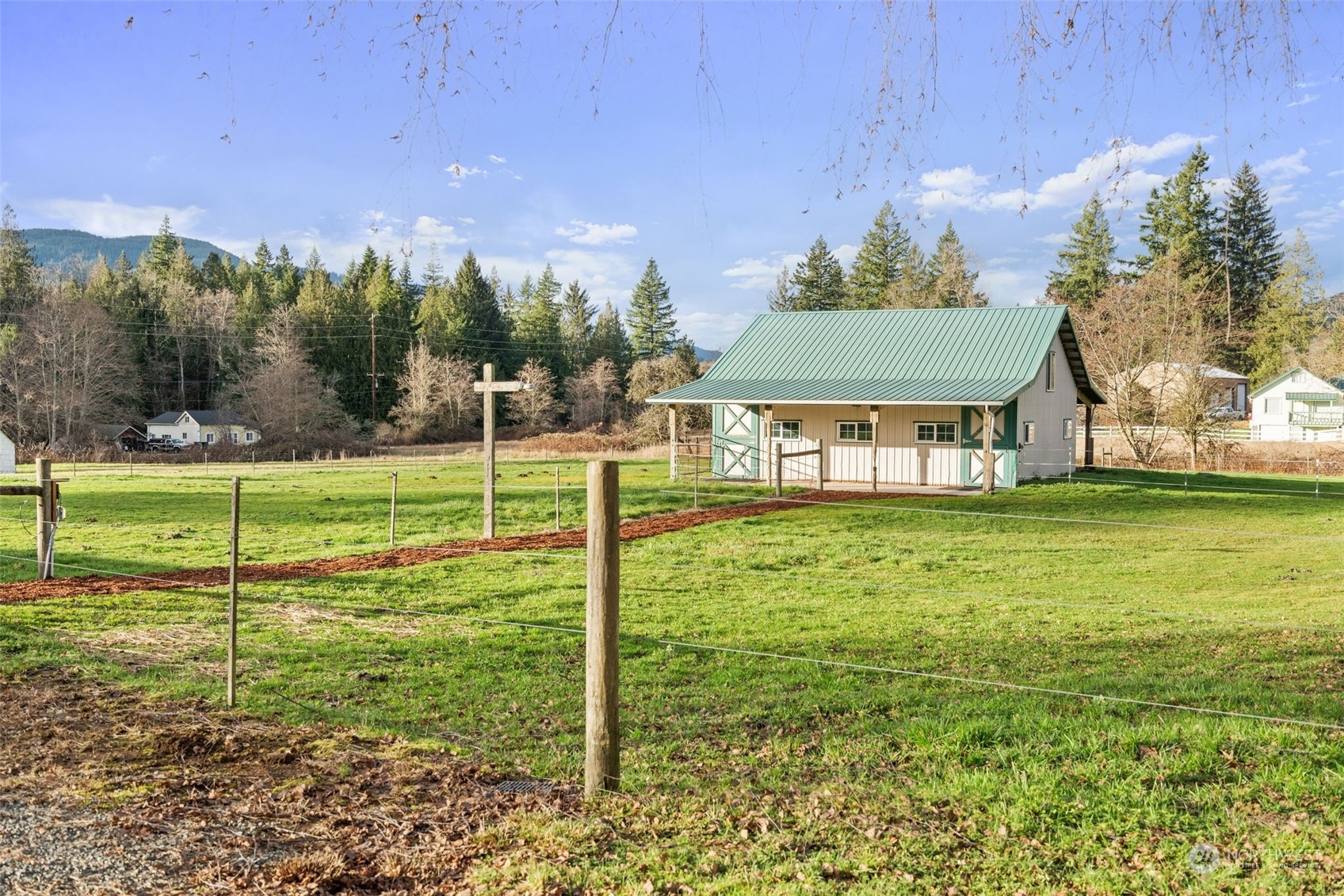 2628 Old Highway 99 North Road Burlington, WA 98233 - Photo 24 of 40 a view of a house with a backyard