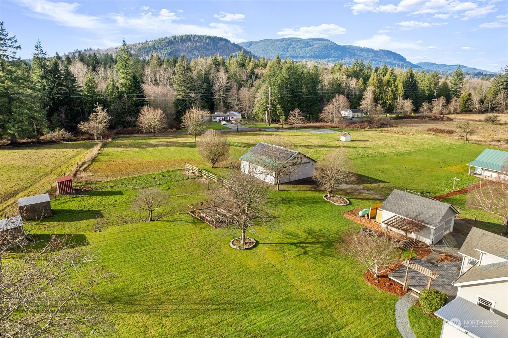 2628 Old Highway 99 North Road Burlington, WA 98233 - Photo 37 of 40 a view of a swimming pool with a yard
