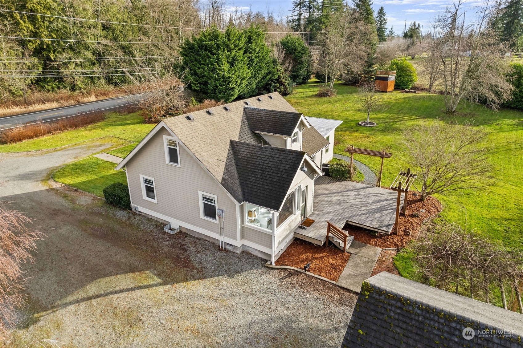 2628 Old Highway 99 North Road Burlington, WA 98233 - Photo 4 of 40 a view of a garden with lawn chairs