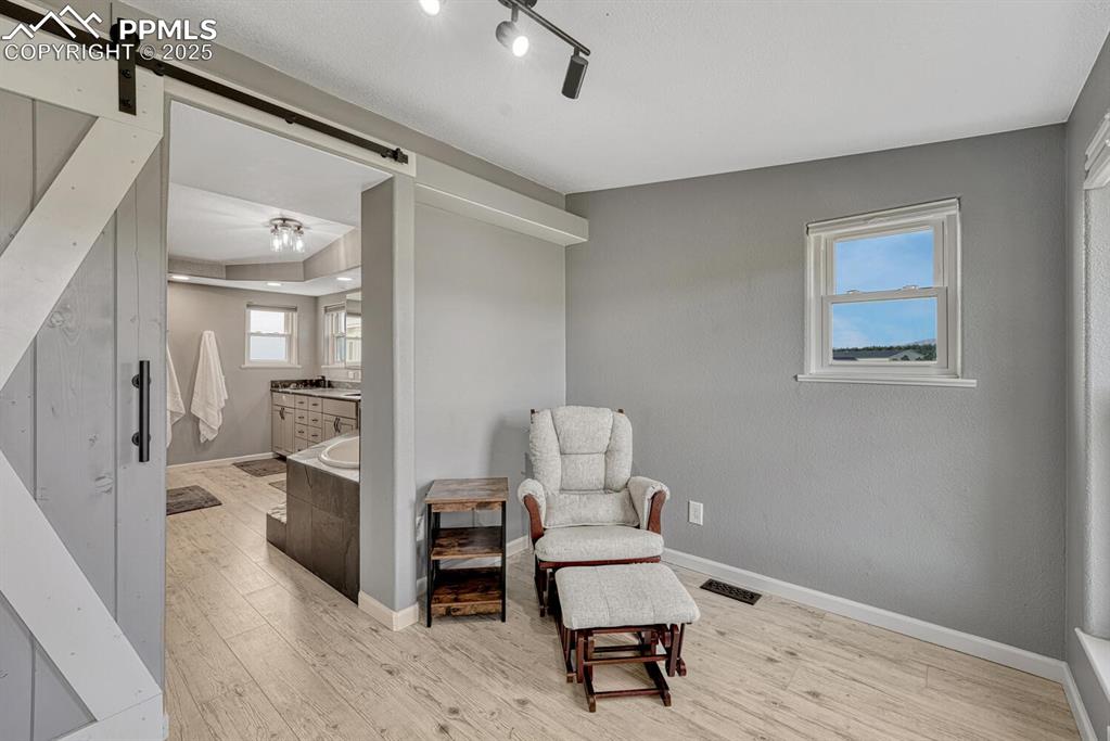 15371 Buck Creek Road Elbert, CO 80106 - Photo 14 of 50 a living room with furniture and a table