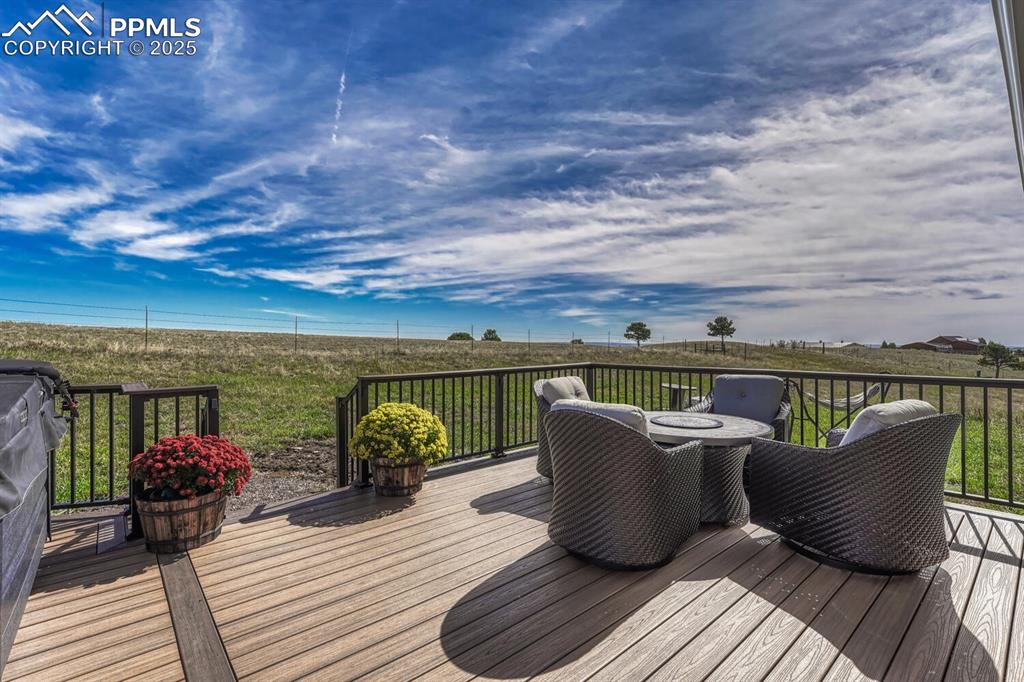 15371 Buck Creek Road Elbert, CO 80106 - Photo 31 of 50 a view of a roof deck with furniture