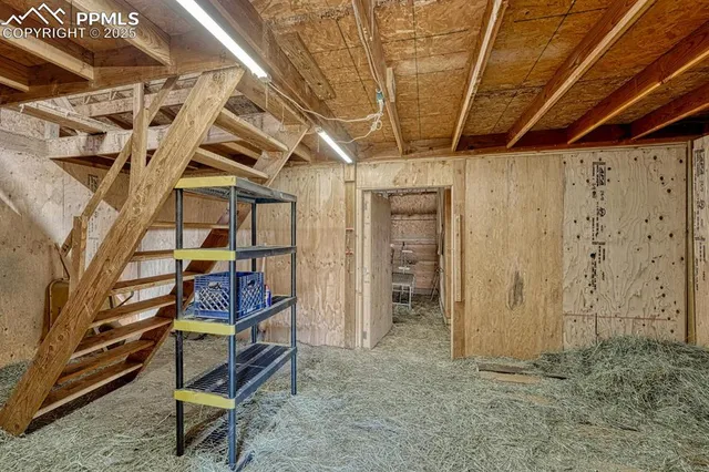 a view of a wooden door of the house