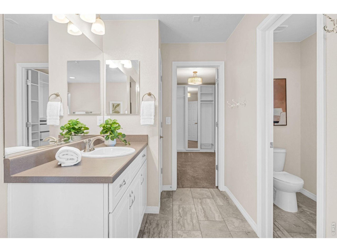 6028 Moran Road Timnath, CO 80547 - Photo 19 of 49 a bathroom with a sink and a mirror