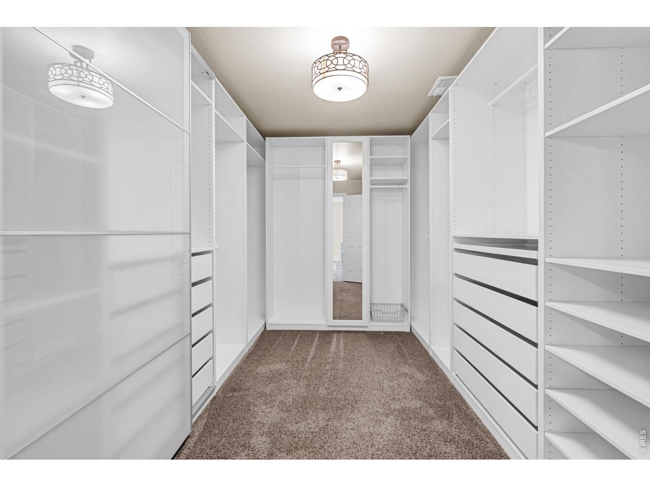 6028 Moran Road Timnath, CO 80547 - Photo 20 of 49 a view of an empty walk in closet