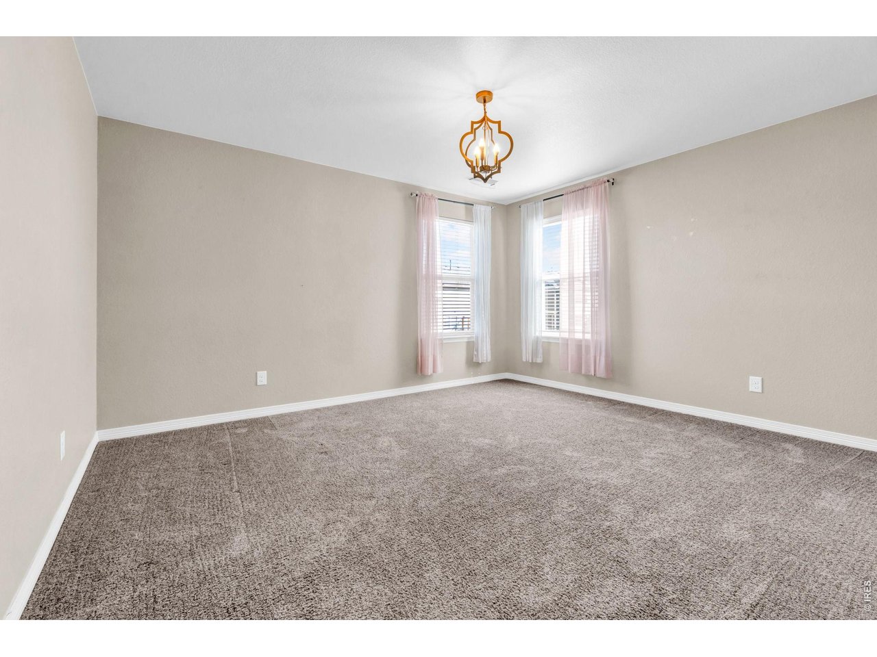 6028 Moran Road Timnath, CO 80547 - Photo 26 of 49 a view of an empty room and a window