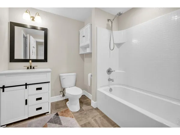 a bathroom with a sink and a yard