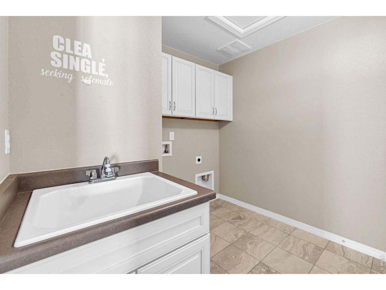 6028 Moran Road Timnath, CO 80547 - Photo 43 of 49 a bathroom with a sink and a mirror