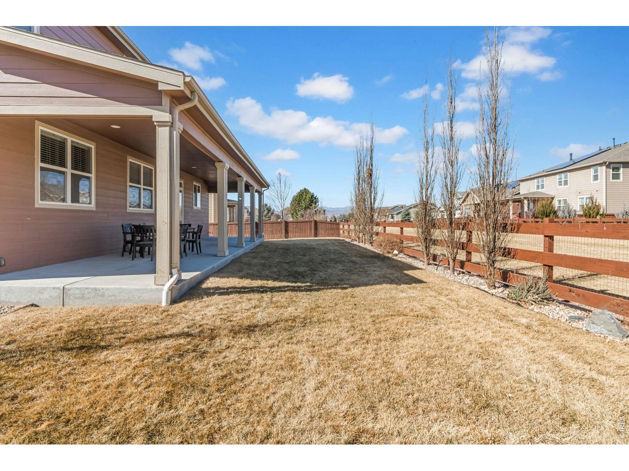 6028 Moran Road Timnath, CO 80547 - Photo 45 of 49 a view of a house with a yard