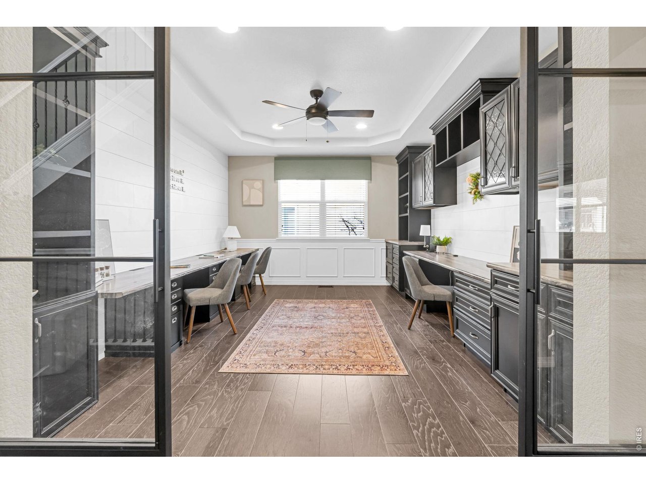 6028 Moran Road Timnath, CO 80547 - Photo 5 of 49 a open kitchen with granite countertop a stove a sink dishwasher and a refrigerator with wooden floor