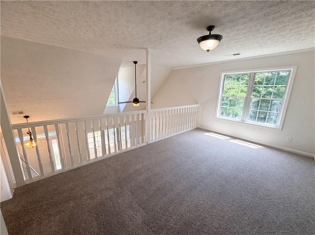722 Ridgetop Road Bethlehem, GA 30620 - Photo 10 of 23 a view of an empty room with a window