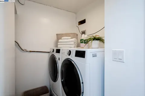a table and chairs sitting in front of a door