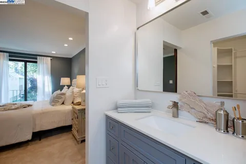 a bedroom with a bed and furniture