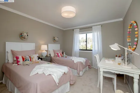 a view of a house with swimming pool and yard