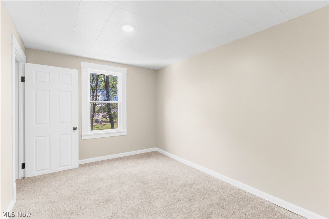 4646 Kirk Road Youngstown, OH 44515 - Photo 18 of 18 Empty room featuring carpet floors