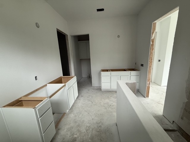 127 Riparian Elms Road Bertram, TX 78605 - Photo 13 of 22 New construction with clean lines and a functional layout await your personal touches.